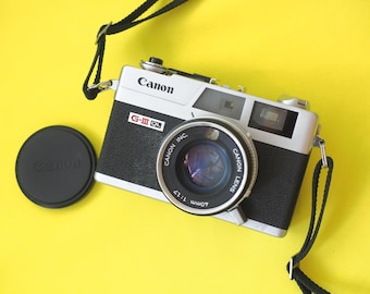 Fotocamera a telemetro Canon Canonet QL17 G-III da 35 mm PARZIALMENTE FUNZIONANTE