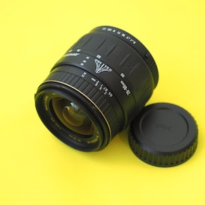 Objetivo zoom Quantaray 28-80 mm 1:3.5-5.6 para cámaras réflex Pentax K Pk con montura Kaf (FUNCIONA)