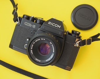 Cámara réflex digital Ricoh CR-5 de 35 mm para estudiantes + objetivo de 55 mm f/2.2. FUNCIONA. ***Fotómetro defectuoso***