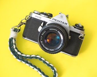 Pentax ME 35 mm-filmreflexcamera + 50 mm-lens WERKT ***PROBLEMEN**