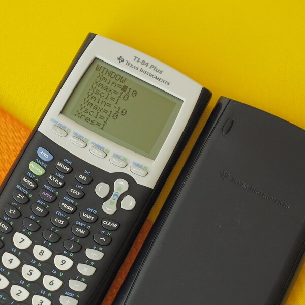 Texas Instruments TI-84 Plus Graphing Scientific Calculator WORKING