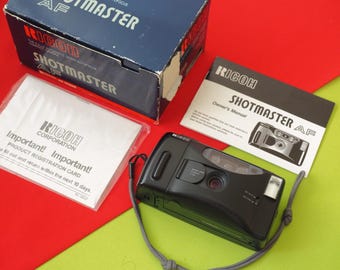 Cámara compacta de apuntar y disparar Ricoh Shotmaster AF de 35 mm + manual + caja FUNCIONANDO