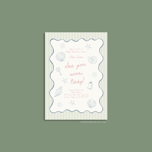 May include: A white and blue baby shower invitation with a striped background. The invitation features a seashell border and the text "Sea you soon Baby!" in pink and blue.