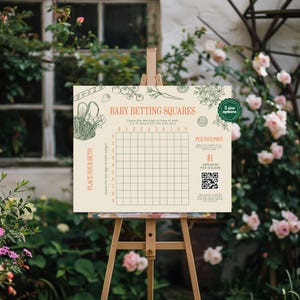 May include: A printable baby shower game board with a floral design. The game is called "Baby Betting Squares" and players guess the last digit of the baby's time of birth. The board has a grid with numbers 0-9 on the top and side. There is a QR code and instructions to pick a price per square.