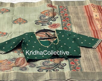 Tussar mix jute saree teamedup with contrast designer stitched blouse