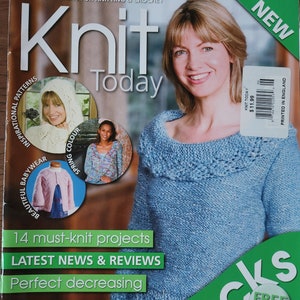May include: Knit Today magazine cover featuring a woman wearing a blue knitted sweater. The cover also features a photo of a knitted baby sweater and a photo of a woman wearing a white knitted sweater. The magazine title is "Knit Today" and the cover text includes "14 must-knit projects", "LATEST NEWS & REVIEWS", "Perfect decreasing", "20 pages of socks", "FREE GIFT", "Handy travel size for knitting on the go!" and "$11.99".