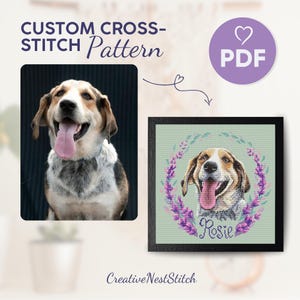 May include: A cross-stitch pattern featuring a dog with a pink tongue sticking out, wearing a blue collar, and surrounded by a wreath of purple flowers. The dog's name, "Rosie", is stitched below the wreath. The pattern is available as a PDF download.