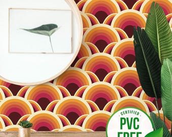 May include: A retro-style wallpaper with a repeating pattern of orange, red, and yellow half-circles. The wallpaper is PVC-free and certified.