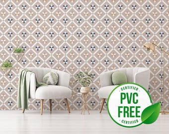 May include: A living room interior with two white armchairs, a small table with a potted plant, and a floor lamp. The wall is covered with a beige and blue geometric patterned wallpaper. A green leaf with the text "CERTIFIED PVC FREE CERTIFIED" is in the foreground.