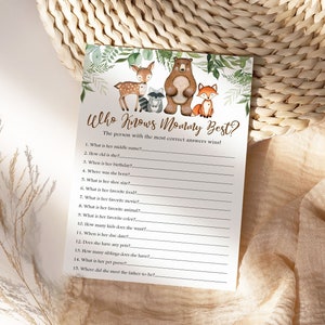 May include: A printable "Who Knows Mommy Best?" game with a woodland theme. The game features a deer, raccoon, bear, and fox illustration. The game includes 15 questions about the mother-to-be.