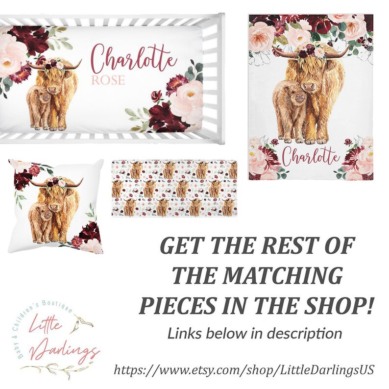 May include: A nursery bedding set with a floral design featuring a Highland cow and calf. The set includes a crib sheet, a pillow, a blanket, and a crib skirt. The crib sheet and blanket are white with a floral pattern in shades of burgundy and pink. The pillow is white with a floral pattern and a Highland cow and calf in the center. The crib skirt is white with a floral pattern and the name "Charlotte" in pink lettering. The set is available in other colors and designs.