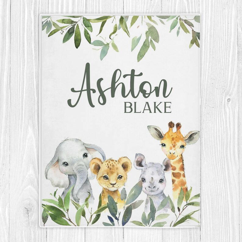 May include: A watercolor illustration of a jungle scene with a giraffe, elephant, lion, and rhinoceros. The illustration is personalized with the name Ashton Blake.