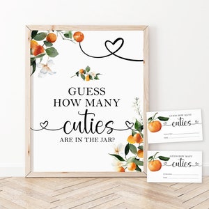 May include: A printable baby shower game sign with orange blossoms and the text "Guess how many cuties are in the jar?" with two matching printable guess cards.