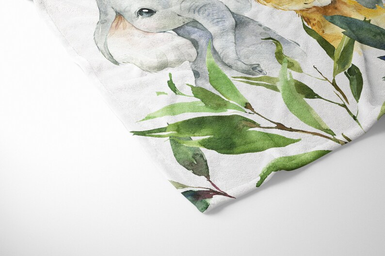 May include: Watercolor painting of a baby elephant and a baby giraffe with green leaves. The animals are painted in a light gray and light brown color.