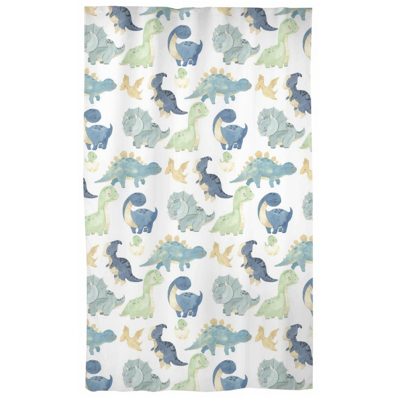 May include: A white shower curtain with a repeating pattern of blue and green dinosaurs. The dinosaurs are in various poses, including walking, standing, and sitting. Some dinosaurs are holding eggs.
