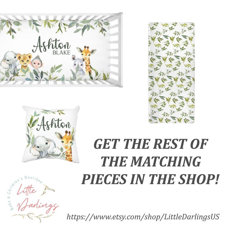 May include: A white crib sheet with a green leafy pattern and a watercolor illustration of a giraffe, elephant, and lion. The sheet is personalized with the name "Ashton Blake".