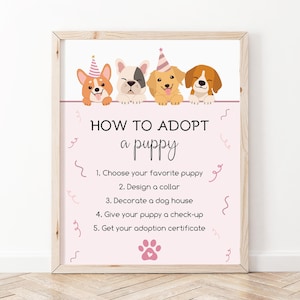 May include: Pink and white printable sign with four cartoon puppies wearing party hats. The sign says "How to Adopt a Puppy" and lists five steps: choose your favorite puppy, design a collar, decorate a dog house, give your puppy a check-up, and get your adoption certificate.