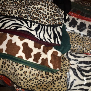 Greyhound size dog winter coats. Double fleece. Top quality. Assorted colours.