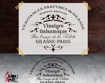 Peut inclure: Un pochoir noir et blanc pour un projet artisanal. Le pochoir présente une étiquette de style vintage qui dit "VERITABLES PARFUMES de GRASSE MARQUE DEPOSEE Vinaigre Balsamique Pour l'usage de la Toilette GRASSE-PARIS".