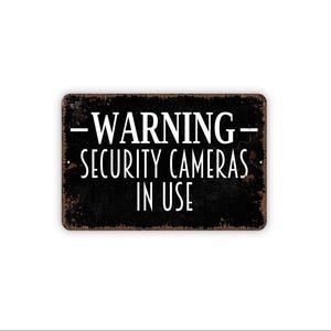 Warning Security Cameras In Use Sign | Surveillance Area Wall Decor | Metal Sign or Magnet | Home Business Safety | Property Warning