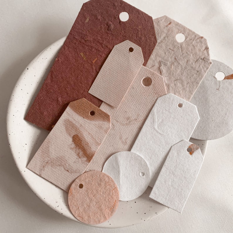 Handmade paper tags, in random sizes, and colours, with minimal cream and red palette, metallic accents, and textured, ephemera tags image 1