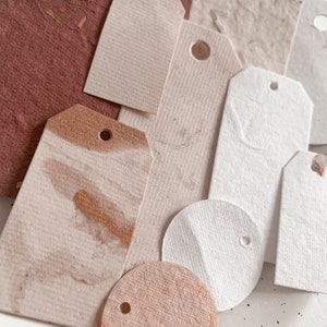 Handmade paper tags, in random sizes, and colours, with minimal cream and red palette, metallic accents, and textured, ephemera tags image 7