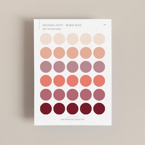 May include: A sheet of matte sticker dots in various shades of red, from light pink to deep burgundy. The sheet is titled "Minimal Dots - Warm Reds" and "Matt Sticker Sheet".