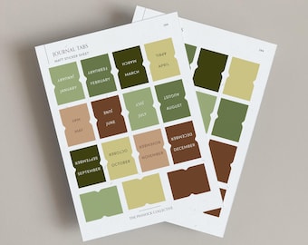 May include: A sheet of sticker tabs with the months of the year printed on them. The tabs are in various shades of green, brown, and beige. The text "JOURNAL TABS" and "MATT STICKER SHEET" is printed at the top of the sheet. The text "THE PINNOCK COLLECTIVE" is printed at the bottom of the sheet.
