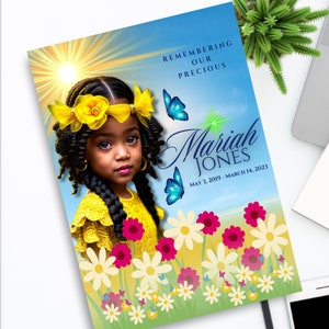 May include: A memorial card featuring a photograph of a young girl with braids and a yellow headband. The background is a blue sky with white clouds and a sun shining. There are butterflies and flowers in the background. The text on the card reads "Remembering Our Precious Mariah Jones May 3, 2019 - March 14, 2023".