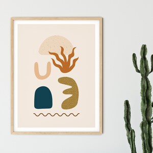 May include: Abstract art print with a beige background and a variety of shapes in brown, orange, yellow, and blue. The shapes include a half-circle, a wavy line, a curved shape, and a blob.