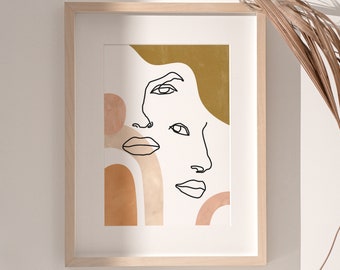 May include: A framed print with a minimalist line drawing of two faces in a muted color palette of brown, beige, and gold.