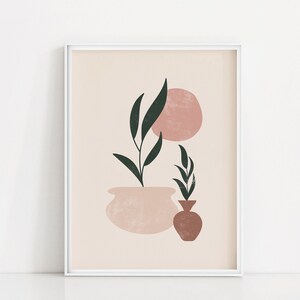 Puede incluir: Una impresión de arte minimalista con dos plantas en macetas con hojas verdes sobre un fondo rosa claro. La planta más grande está en una maceta ancha y redonda, mientras que la planta más pequeña está en un jarrón estrecho y redondo. Un círculo rosa está detrás de la planta más grande.