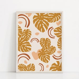 May include: A digital print featuring a pattern of brown monstera leaves and abstract shapes in shades of peach and brown on a white background.