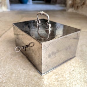 Very solid, heavy, small, antique, French, chrome plated and decorated metal cash box with original key. Circa 1920&#39;s / 40&#39;s