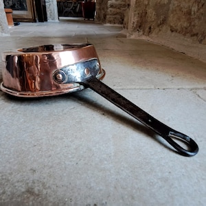 Beautiful, small, handmade, antique, roll-top, French copper saucepan with iron handle and copper rivets. Circa early 1900&#39;s