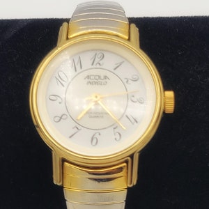 Vintage Acura Indiglo WR zweifarbige runde Damenuhr mit Erweiterungsband Kostüm Schmuck Retro Statement Timepiece Frauen weißes Gesicht
