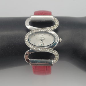 Vintage Vivani Silver Tone Rhinestone Helix Ladies Wrist Watch with Red Faux Leather Cuff Band Costume Jewelry Retro Statement Timepiece