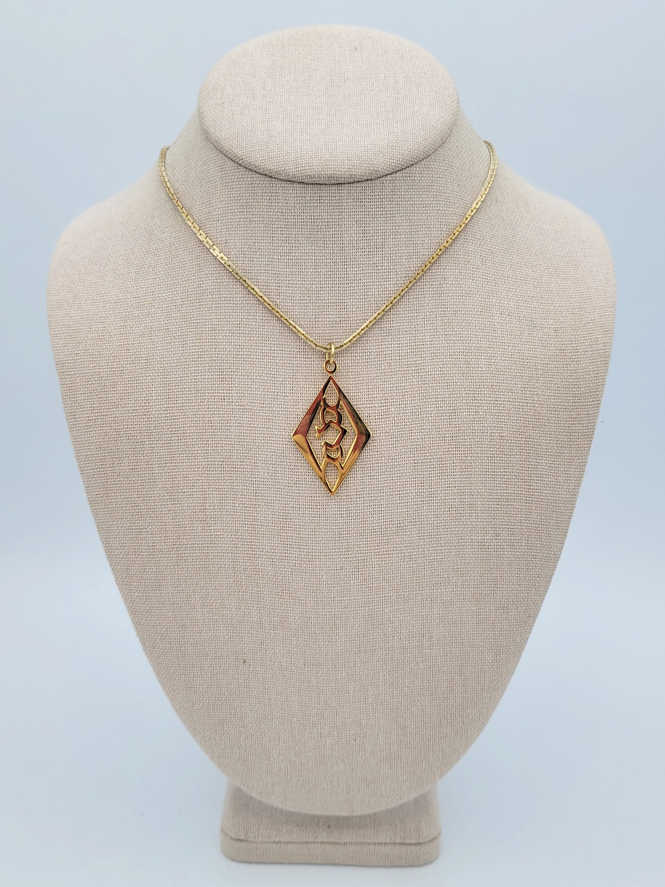 Vintage 1980s Gold Tone Geometric Openwork Pendant With Box Vintage 1980s Gold Tone Geometric Openwork Pendant With Box