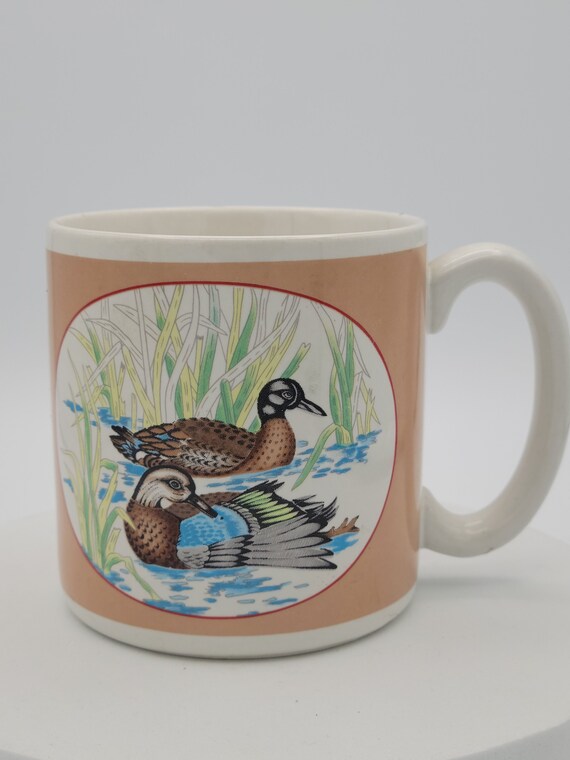 1989 Flowers Inc. Balloons Duck Coffee Mug Item #620000 White Ceramic Retro Pair of Brown & Blue Ducks Enamel Tan Beige Bogart, Georgia