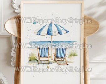 May include: Watercolor print of a beach scene with a blue and white striped umbrella, two matching beach chairs, and the text "WWW.Etsy.com/Shop/ArtsyLine". The artwork is framed in a light wood frame.