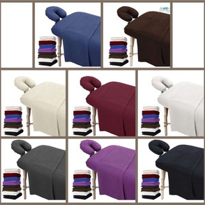 May include: A set of 10 massage table sheets in various colors, including blue, brown, beige, burgundy, gray, purple, and black. Each sheet is shown on a wooden massage table with a matching headrest. The sheets are made of soft, comfortable fabric and are perfect for use in a spa or massage therapy setting.