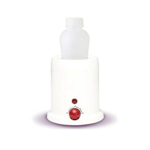 May include: White electric bottle warmer with a red knob and a clear plastic bottle inside. The warmer has a round base and a cylindrical top.