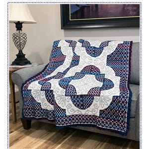 May include: A crocheted afghan with a geometric pattern in white, blue, and purple, draped over a gray sofa. The afghan features the text "Blackwork Drunkard's Path Afghan" and the Kathryn Clark Crochet logo.