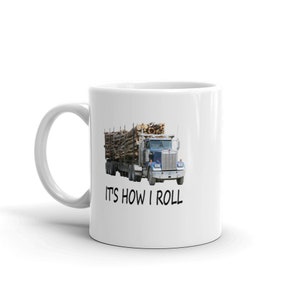 May include: White ceramic mug featuring a blue and white semi-truck carrying logs. The text "IT'S HOW I ROLL" is printed in black below the truck.
