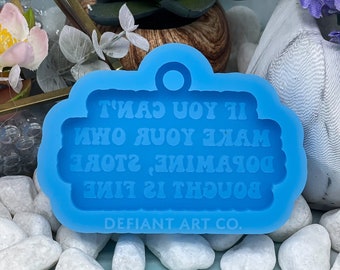 Molde de silicona para llavero de resina y arcilla que se compra en la tienda de dopamina.