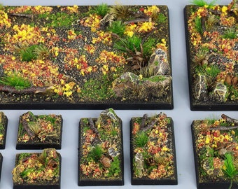 May include: A set of 10 miniature terrain tiles for tabletop gaming. The tiles feature a forest scene with green grass, brown dirt, and yellow leaves. The tiles are made of a durable material and are perfect for adding realism to your gaming table.