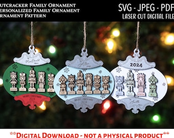 May include: Three personalized wooden nutcracker family Christmas ornaments with a green, blue, and white background. The ornaments feature a family of nutcrackers with the family name and the year 2024.
