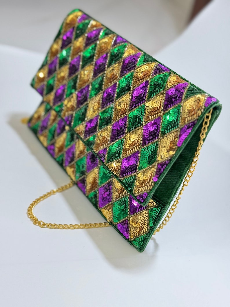 purple green and gold meaning mardi gras