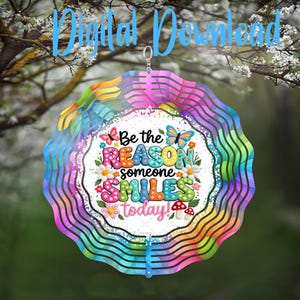 May include: A colorful wind spinner with a cheerful message, "Be the REASON someone SMILES today!" The design features a rainbow of colors, butterflies, flowers, and mushrooms. The text "Digital Download" is at the top.
