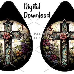 May include: A pair of teardrop-shaped earrings with a stained glass design featuring a cross surrounded by colorful flowers.